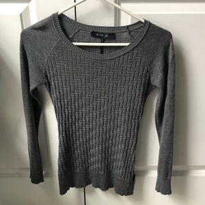 Grey long sleeve shirt.